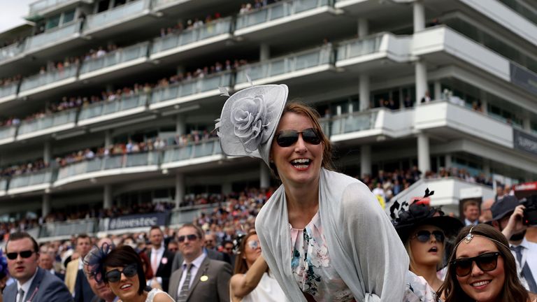 Ladies cheer home their horse