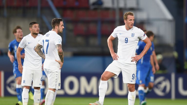 Danny Ings (No 17) and Harry Kane look dejected