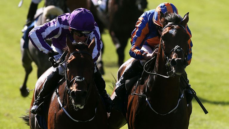 Bondi Beach ridden by Seamie Heffernan (left) on the way to winning the The At The Races Curragh Cup during day three of the Irish Derby Festival at the Cu
