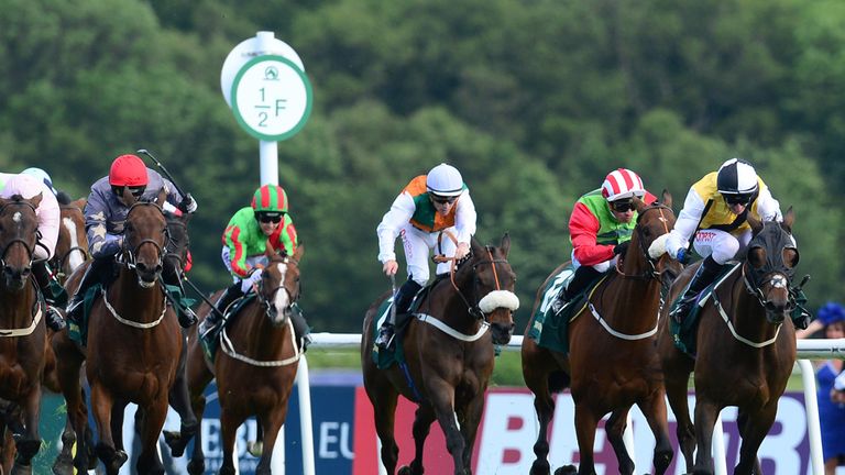 Quest For More ridden by George Baker (right) wins the John Smith's Northumberland Plate during the John Smith's Northumberland Plate Day at Newcastle Race