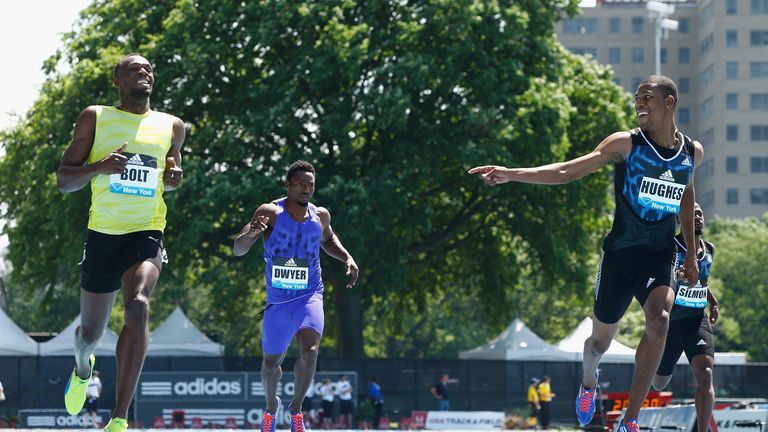 Zharnel Hughes finishes behind Usain Bolt in New York earlier in June