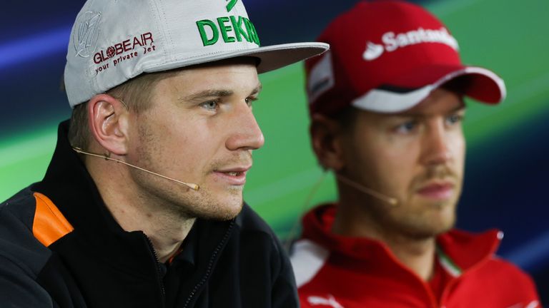 Nico Hulkenberg alongside Sebastian Vettel in the drivers' press conference for the Austrian GP