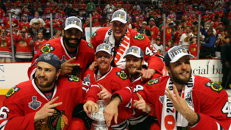 The Chicago Blackhawks celebrate with the Stanley Cup