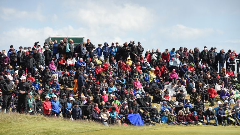 Not a spare space available around the 18th green.