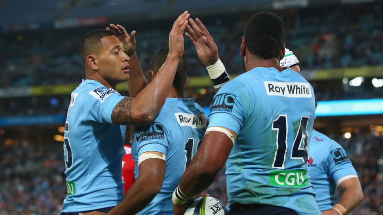 Israel Folau congratulates Taqele Naiyaravoro as he celebrates a try