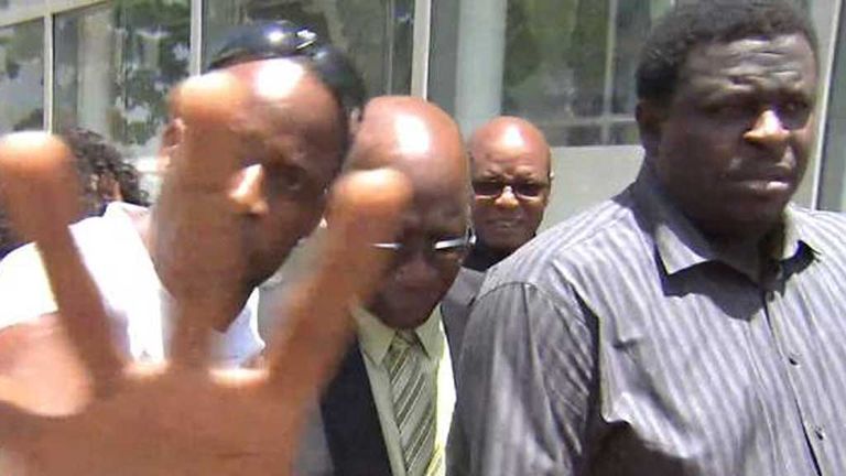 Jack Warner and his bodyguards in Port of Spain