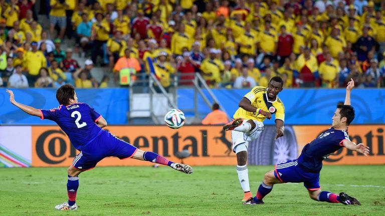 CUIABA, BRAZIL - JUNE 24:  Jackson Martinez of Colombia shoots and scores his team's third goal during the 2014 FIFA World Cup Brazil Group C match between