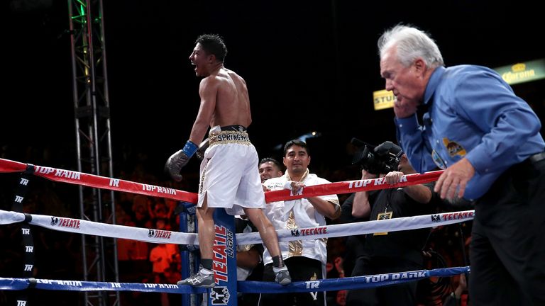 Jessie Vargas celebrates as he mistakenly thinks referee Pat Russell has stopped the fight on a knockout over Timothy Bradley 