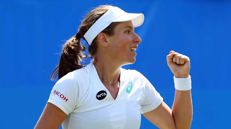 Johanna Konta celebrates her victory over Garbine Muguruza