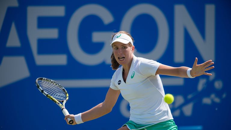 Johanna Konta of Great Britain returns a shot during her victory against Monica Puig of Puerto Rico on day four of the WTA