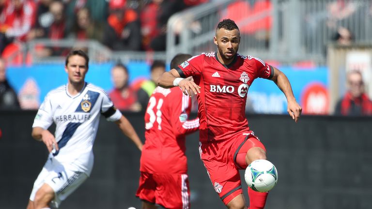 TORONTO, CANADA - MARCH 30:  John Bostock #7 of Toronto FC grabs a ball in an MLS game against the Los Angeles Galaxy on March 30, 2013