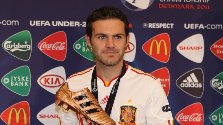 Juan Mata  of Spain receives the bronze boot after the UEFA European Under-21 Championship Final match between Spain and Switzerland in Denmark, 2011