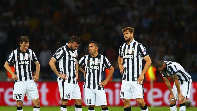 Juventus players look dejected after the third Barcelona goal by Neymar during the UEFA Champions League Final