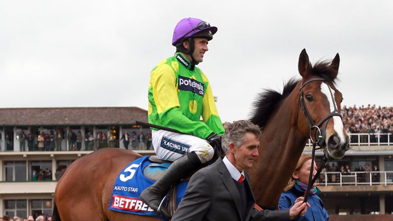 Kauto Star ridden by Ruby Walsh are paraded before the start of the Betfred Cheltenham Gold Cup Chase