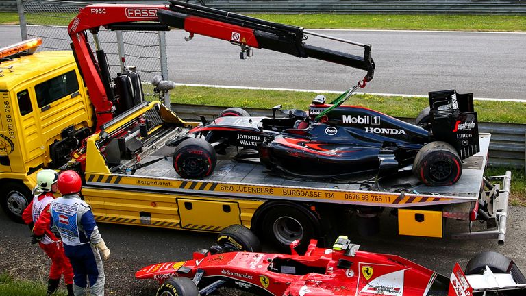 Raikkonen and Alonso's broken cars