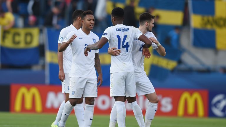 Liam Moore celebrates with Nathaniel Chalobah after the UEFA Under-21 European Championship 2015 match between Sweden and England