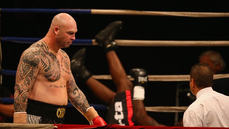 MELBOURNE, AUSTRALIA - APRIL 28:  Lucas Browne of Australia looks on as James Toney of the USA falls onto the canvas during the WBC Super Heavyweight bout 