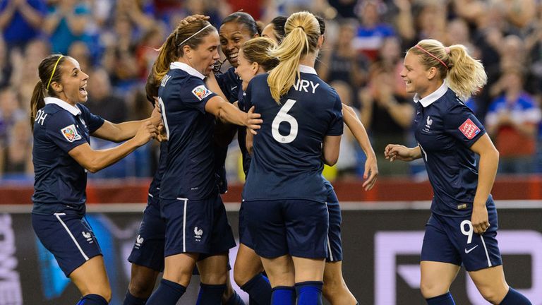 Marie Laure Delie celebrates her France team-mates