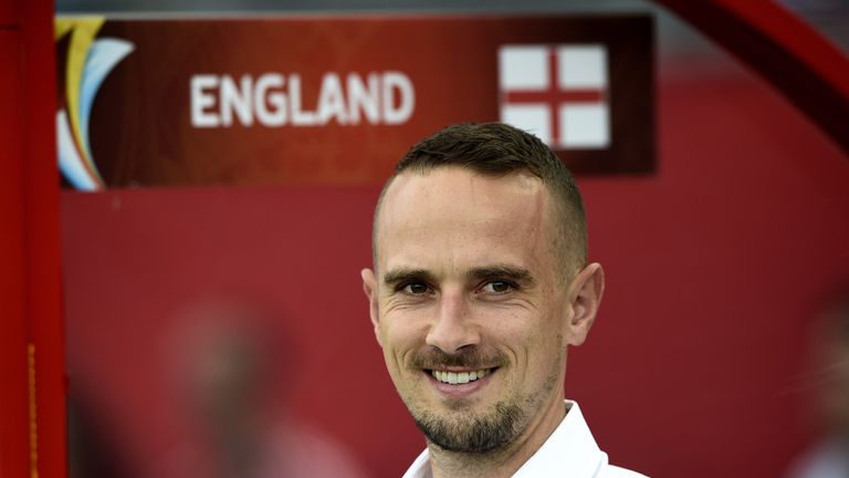 England's head coach Mark Sampson smiles during a Group F match at the 2015 FIFA Women's World Cup between England and Mexico.