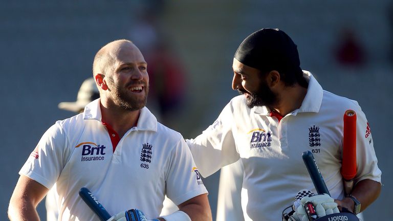AUCKLAND, NEW ZEALAND - MARCH 26:  Matt Prior (L) and Monty Panesar (R) of England leaves the field at the end of day five of the Third Test match between 