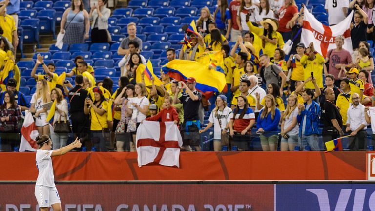 Jodie Taylor celebrates with the England fans after impressing in Montreal against Colombia