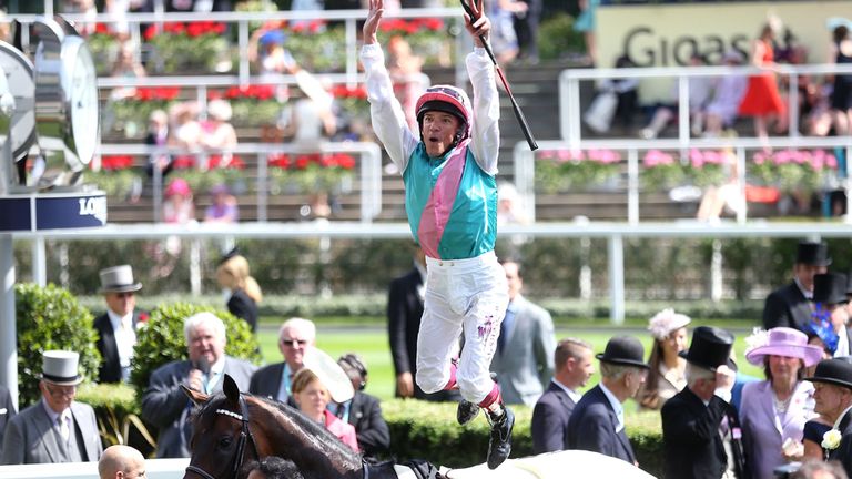 Frankie Dettori celebrates by jumping off Time Test