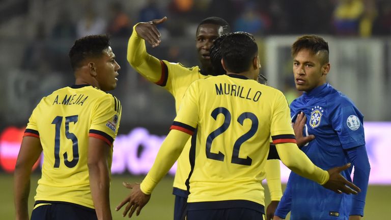Brazil's forward Neymar argues  with Colombians Jeison Murillo and Alexander Mejia.
