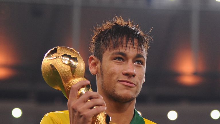 RIO DE JANEIRO, BRAZIL - JUNE 30:  Neymar of Brazil poses with the trophy after the FIFA Confederations Cup Brazil 2013 Final 