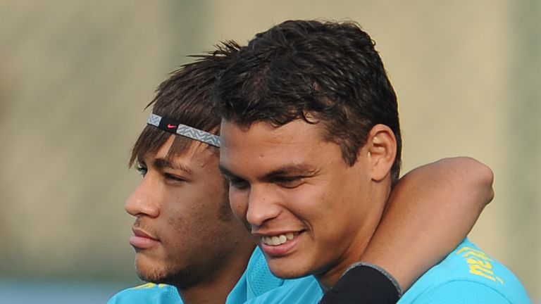 Brazilian footballers Neymar (L) and Thiago Silva take part in a training session of the national team participating in the London Olympics, in Rio de Jane