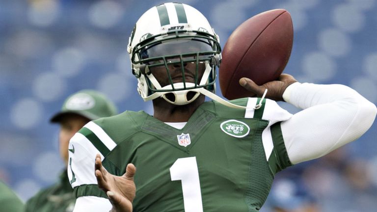 Michael Vick of the New York Jets warming up before a game against the Tennessee Titans