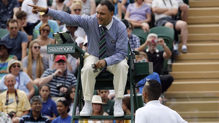 Nick Kyrgios has words with the umpire during his first-round win at Wimbledon