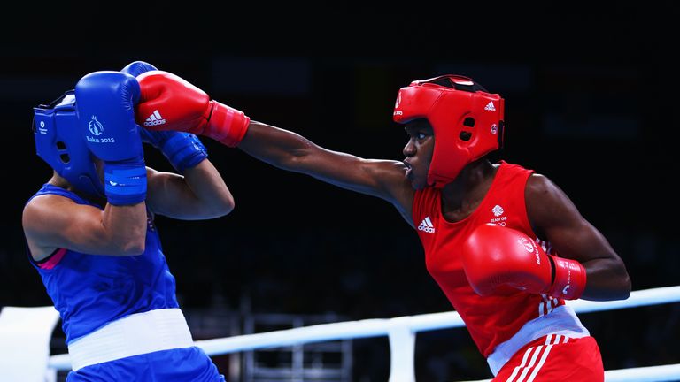 Nicola Adams lands with a right hand during her flyweight opener in Baku