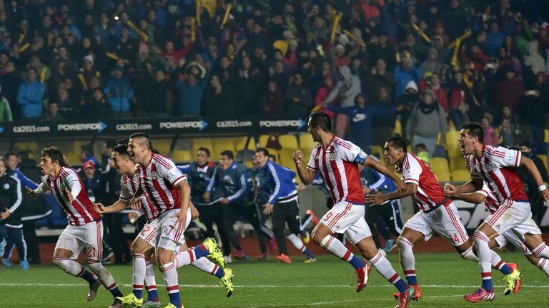 Paraguay's players celebrate after defeating Brazil in the penalty shoot-out of their 2015 Copa America