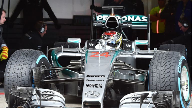 Pascal Wehrlein exits the Mercedes garage during the wet running in Austria