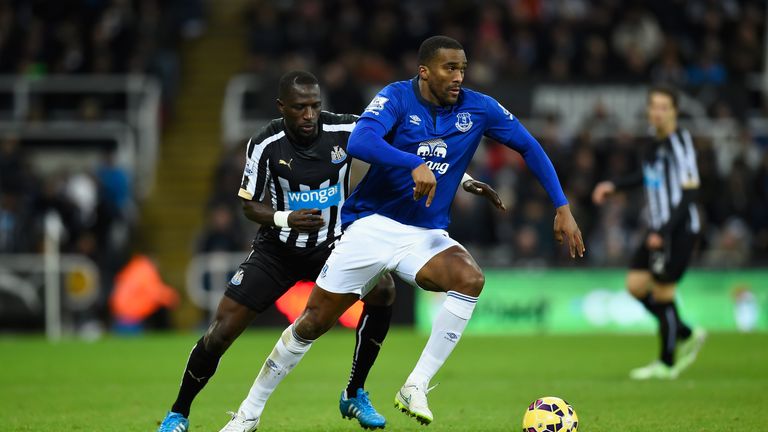 NEWCASTLE, ENGLAND - DECEMBER 28:  Everton player Sylvain Distin (r) in action during the Barclays Premier League match between Newcastle United  