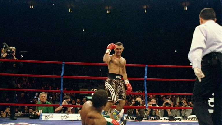 18 Dec 1997:  Prince Naseem Hamed stands over Kevin Kelley during a fight at Madison Square Garden in New York City, New York.