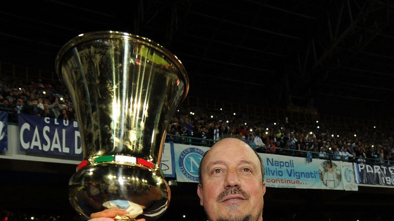 Rafael Benitez head coach of Napoli poses with the Tim Cup before the Serie A match between SSC Napoli and Cagliari Calcio 