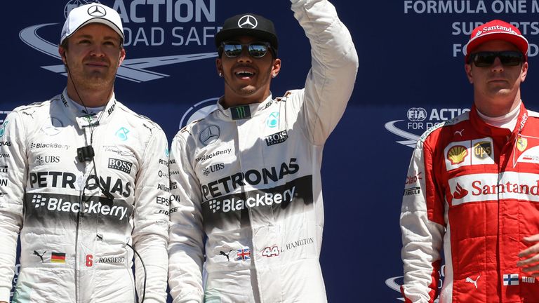 Nico Rosberg, Lewis Hamilton and Kimi Raikkonen celebrate in Parc Ferme after qualifying in Canada