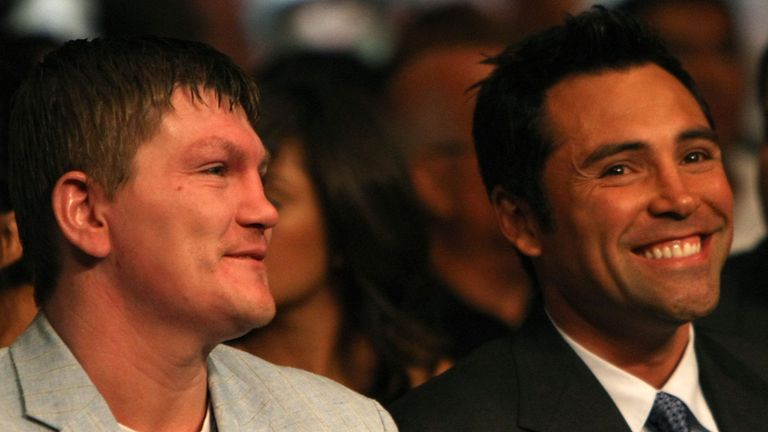 LAS VEGAS - SEPTEMBER 13:  Ricky Hatton of Great Britian looks on with Oscar De La Hoya before the Joel Casamayor and Juan Manuel Marquez  bout at the MGM 