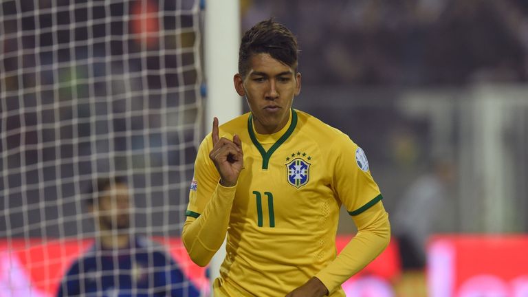 Brazil's forward Roberto Firmino celebrates