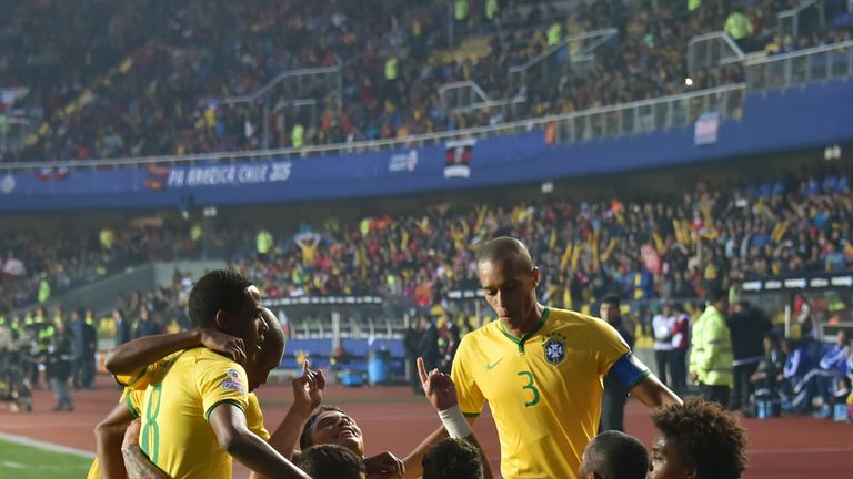 Brazil's forward Robinho (2-R) celebrates with teammates after scoring against Paraguay during their 2015 Copa America