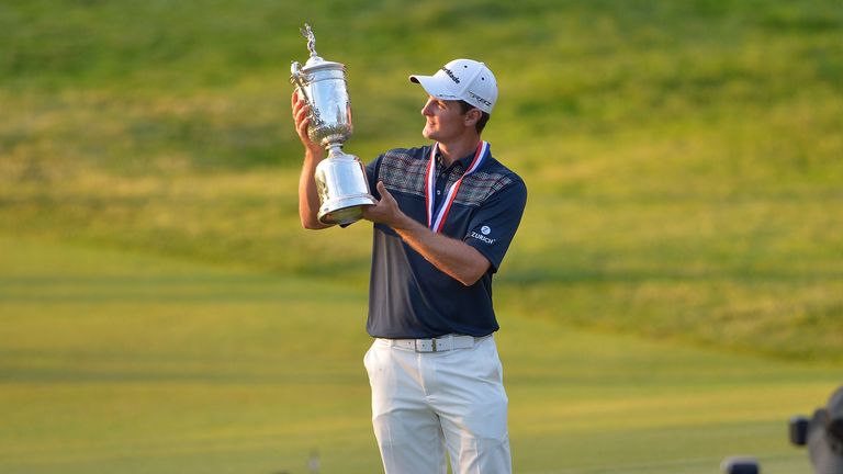 ustin Rose of England as he celebrates with the U.S. Open trophy after winning the 113th U.S. Open at Merion