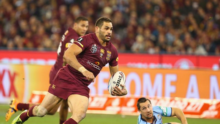 Queensland's Greg Inglis races through to score a try in State of Origin game two