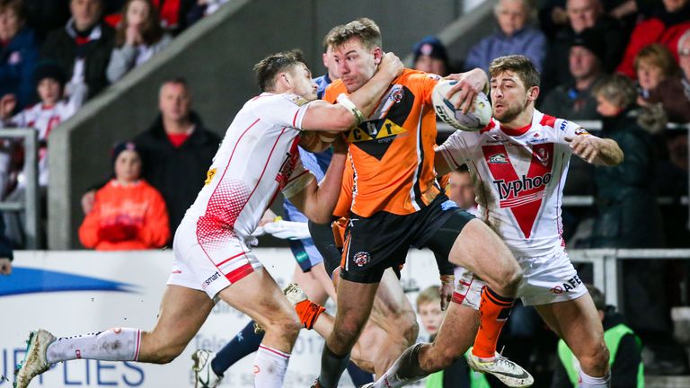 Castleford's Michael Shenton is tackled by St Helens' Jon Wilkin.