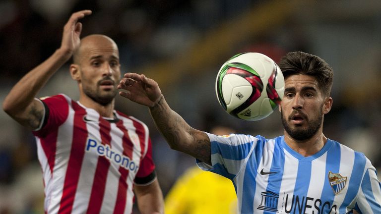 Athletic Bilbao's midfielder Mikel Rico (L) vies with Malaga's forward Samuel Garcia Sanchez