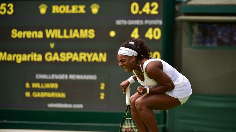 Serena Williams reacts to her first set come back against Russia's Margarita Gasparyan during their first round match on day one of Wimbledon 