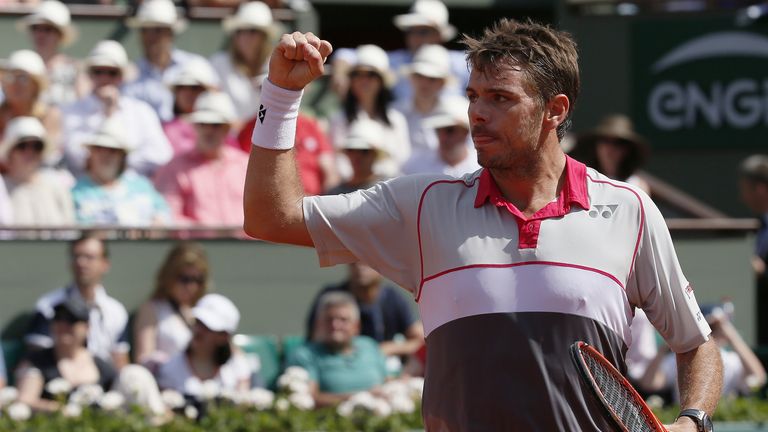 Switzerland's Stanislas Wawrinka reacts after a point against Serbia's Novak Djokovic during their men's final 