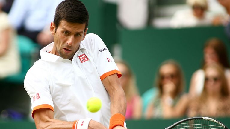 Novak Djokovic plays a backhand during his match against Richard Gasquet at The Boodles