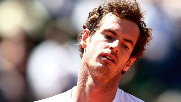 Andy Murray reacts in his Men's Semi Final match against Novak Djokovic at the 2015 French Open at Roland Garros