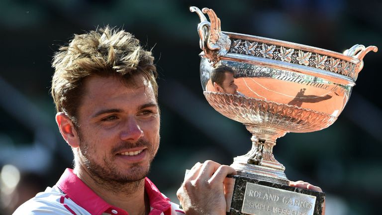 Stan Wawrinka poses with the Coupe de Mousquetaires after victory at the 2015 French Open